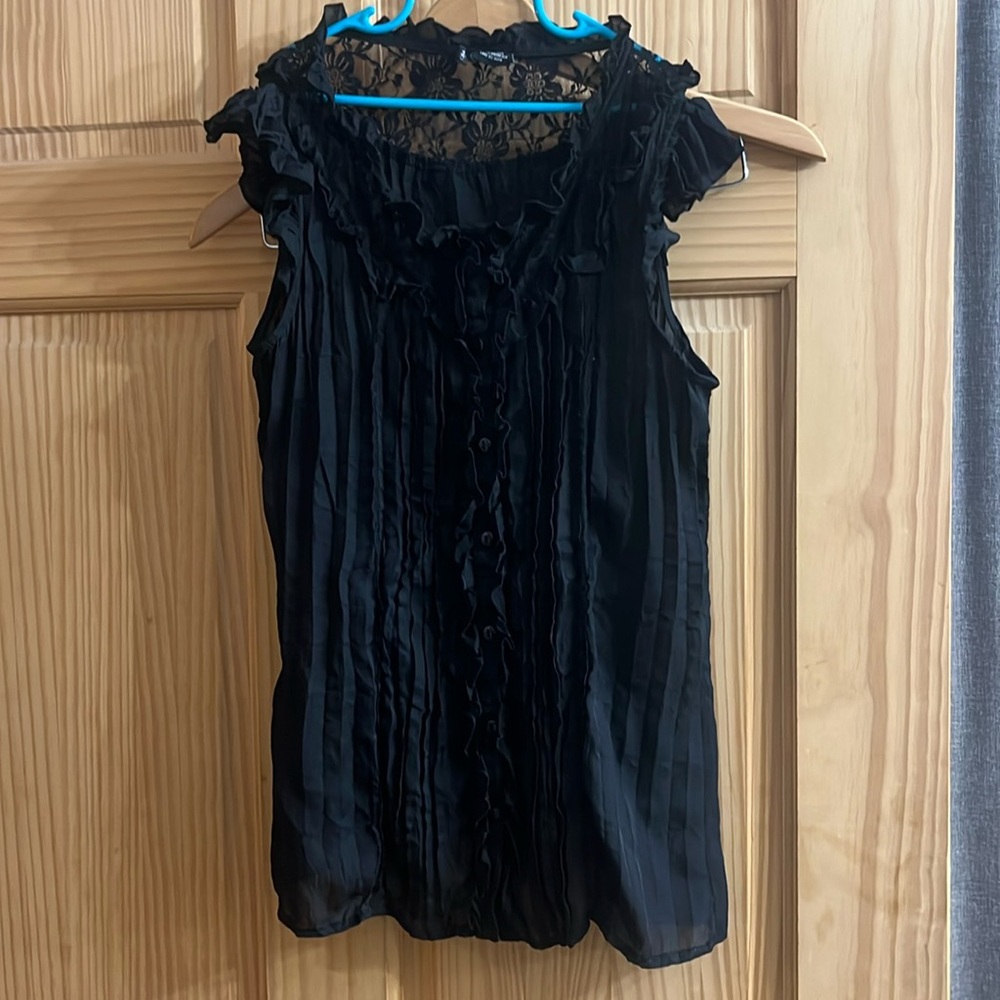 Small black blouse.